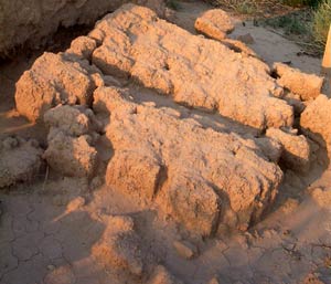 Melted adobe floor